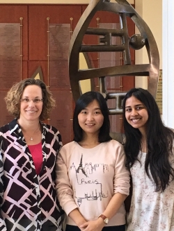 (L-R) Laura P.W. Ranum, director of the UF Center for NeuroGenetics and a professor in the UF College of Medicine department of molecular genetics and microbiology; post-doctoral associate Dr. Yuanjing Liu; and graduate student Amrutha Pattamatta. 